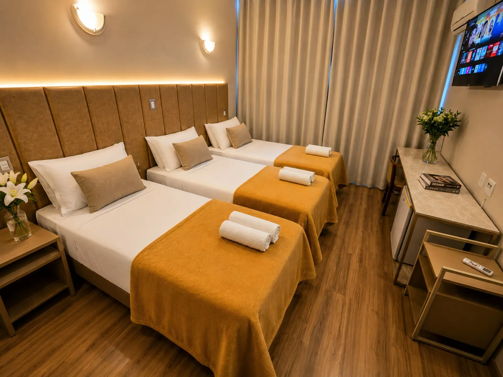 Quarto triplo com três camas de solteiro do Hotel Santoni